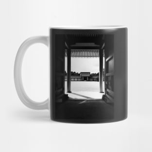 Black and White Shot of Japanese Zen Garden Seen Through Large Gate Mug